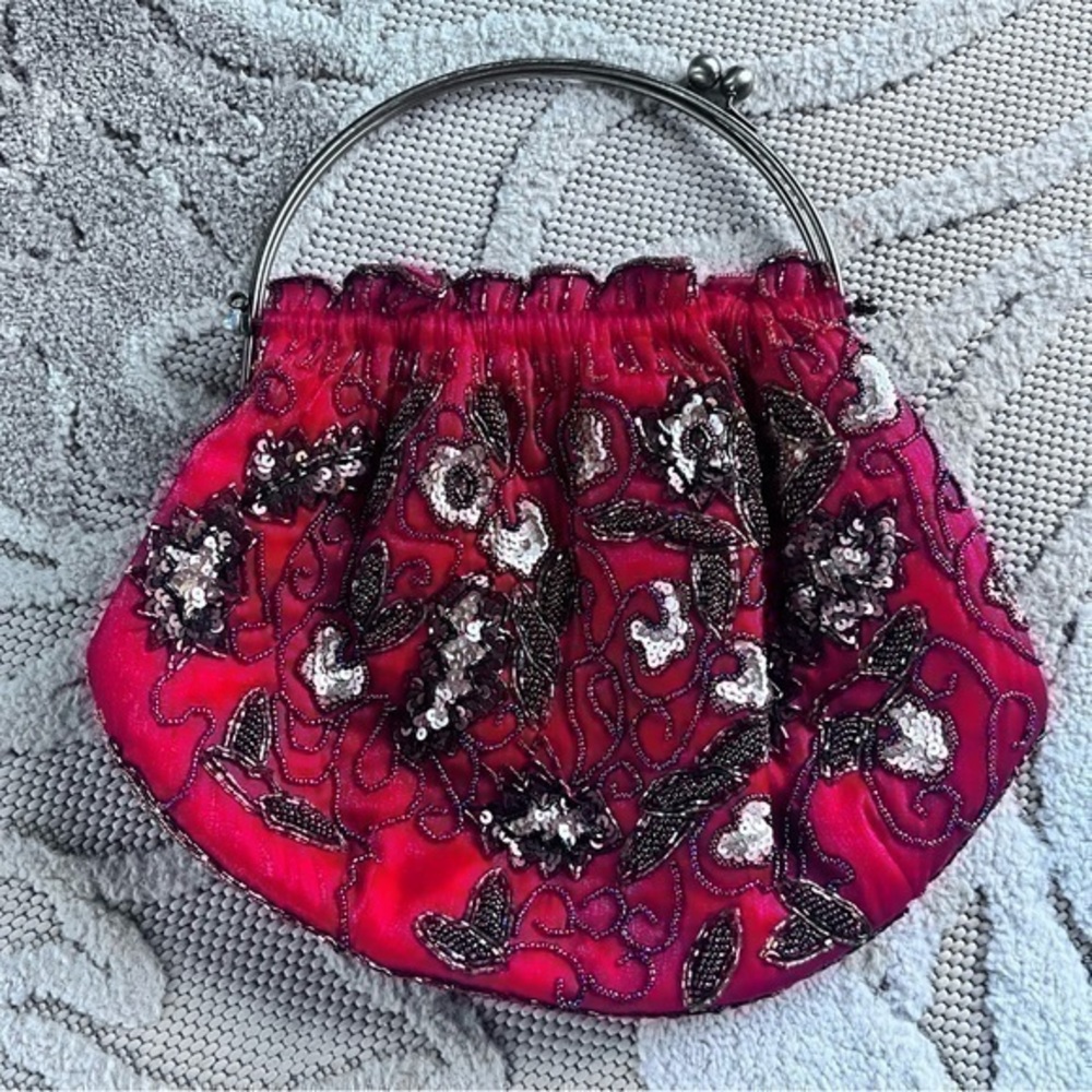Beautiful red beaded handbag with metal handles